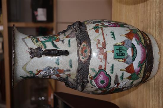 A Cantonese two handled vase, painted with warriors H.35cm